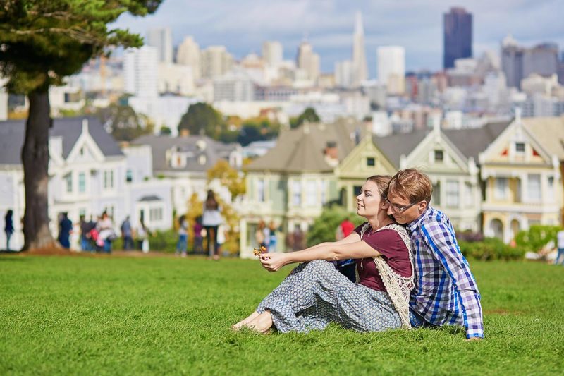 A happy couple in Alamo Square, San Francisco